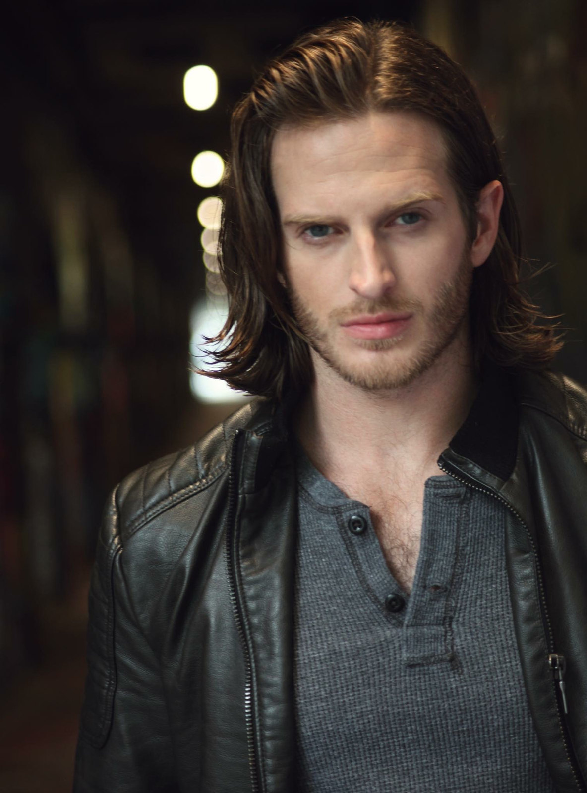 Russell Snipes. Dramatic portrait in a leather jacket, low-key lighting