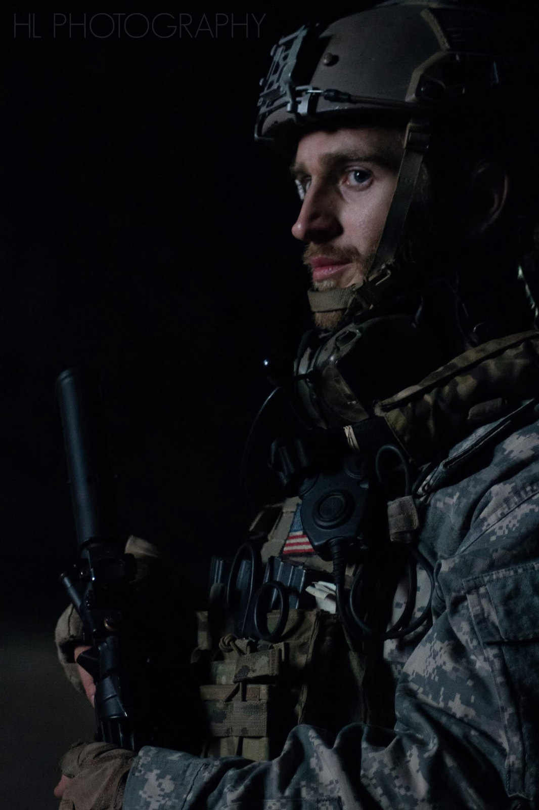 Russell Snipes. Night tactical still in helmet and gear